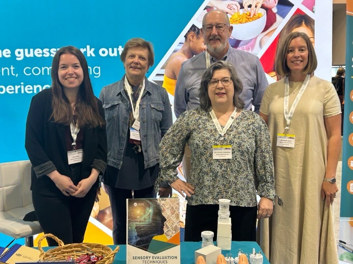 Spectrum team members at a conference